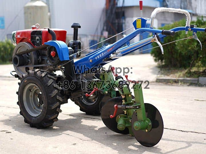 2 wheel drive tractor with double disc plough